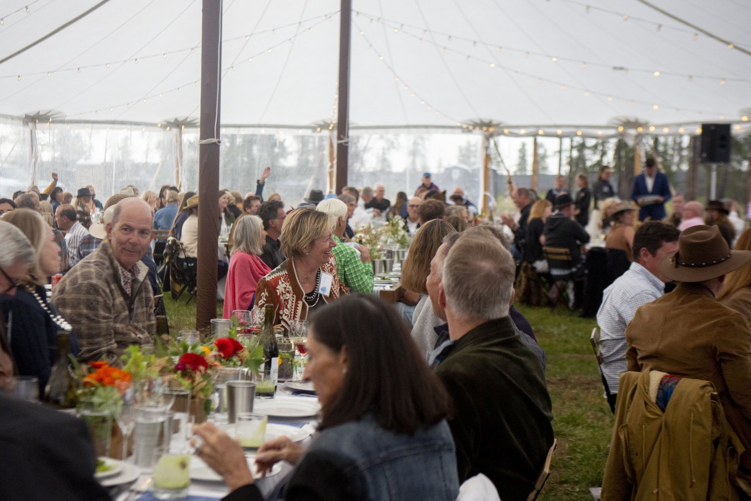 Feast in the Field attendees enjoy a farm-to-table meal. (Photo by Julia Sams)